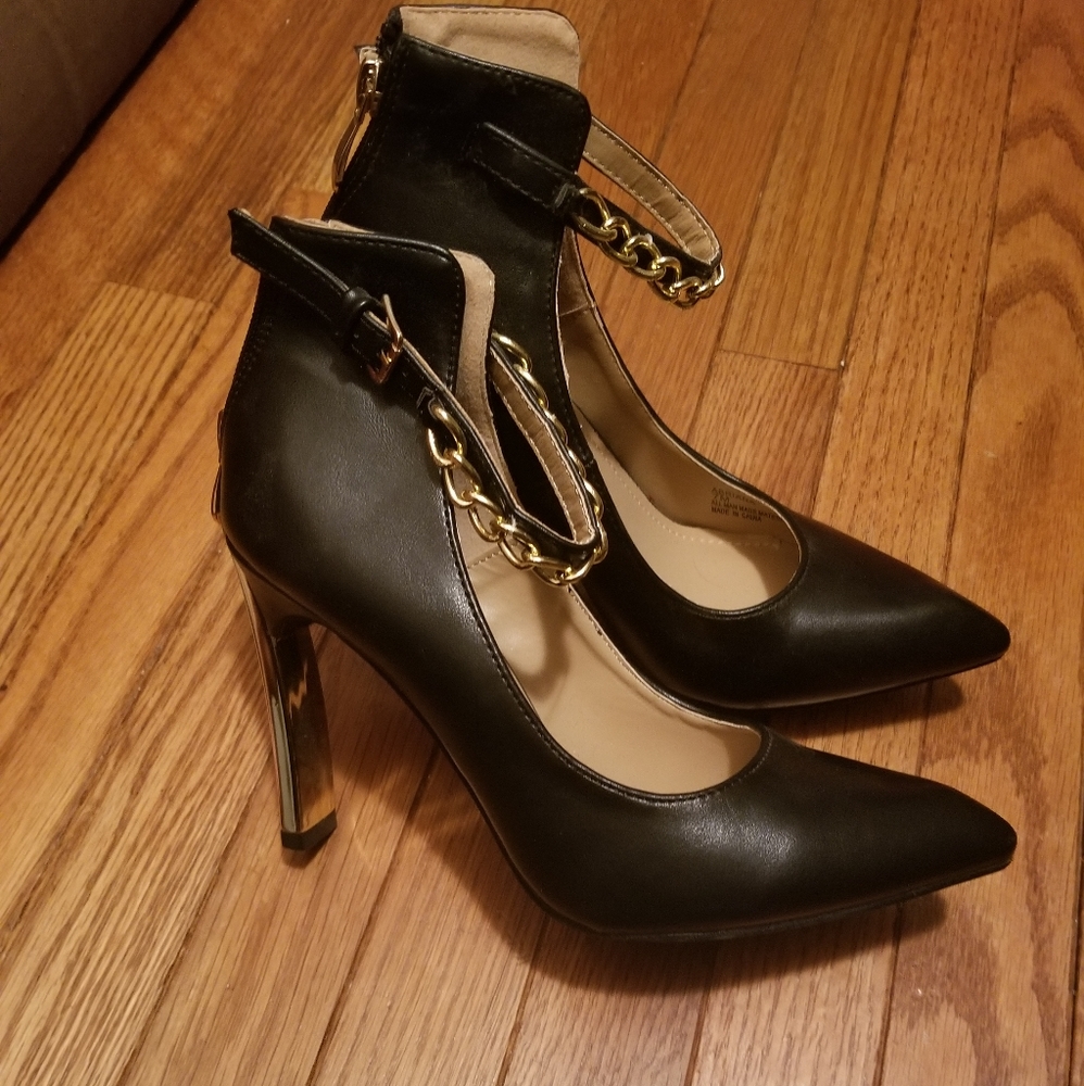 Black and gold heels